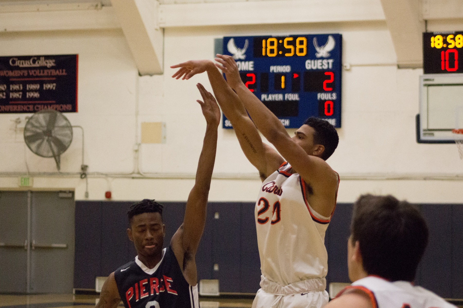 Kyle Gray shoots a jumper over an LA Pierce defender. Photo credit: Semaj Shepheard