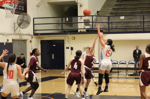 Diana Navarro pulls up a midrange jumper in the paint. Image: Treyvon Watts-Hale