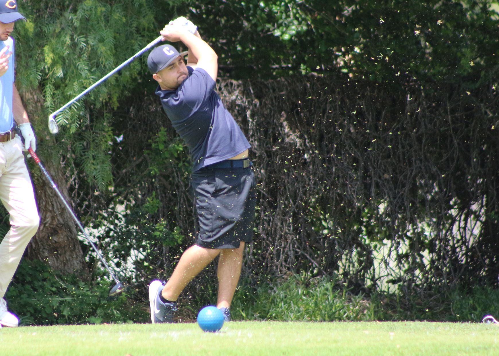 Justin Pruszynski tees off on the 4th hole.