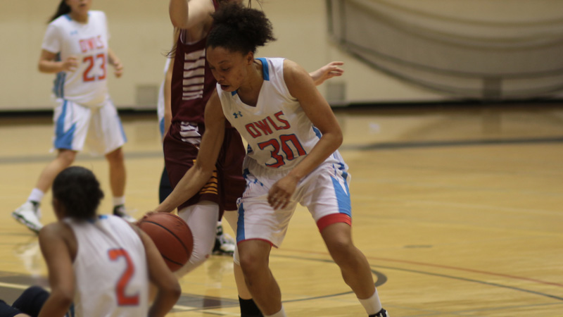 Freshman Jasmine Williams picks up a loose ball in Citrus' big win over Victor Valley. Photo By: Mykenna De Avila. 